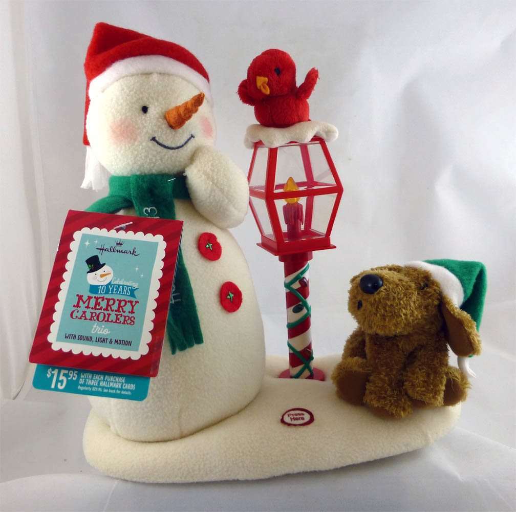 2013 Merry Carolers Trio Press to Listen